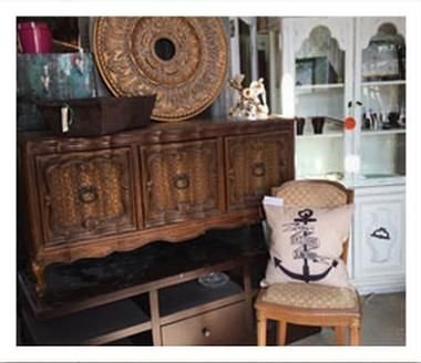 A wooden sideboard styled in the shop